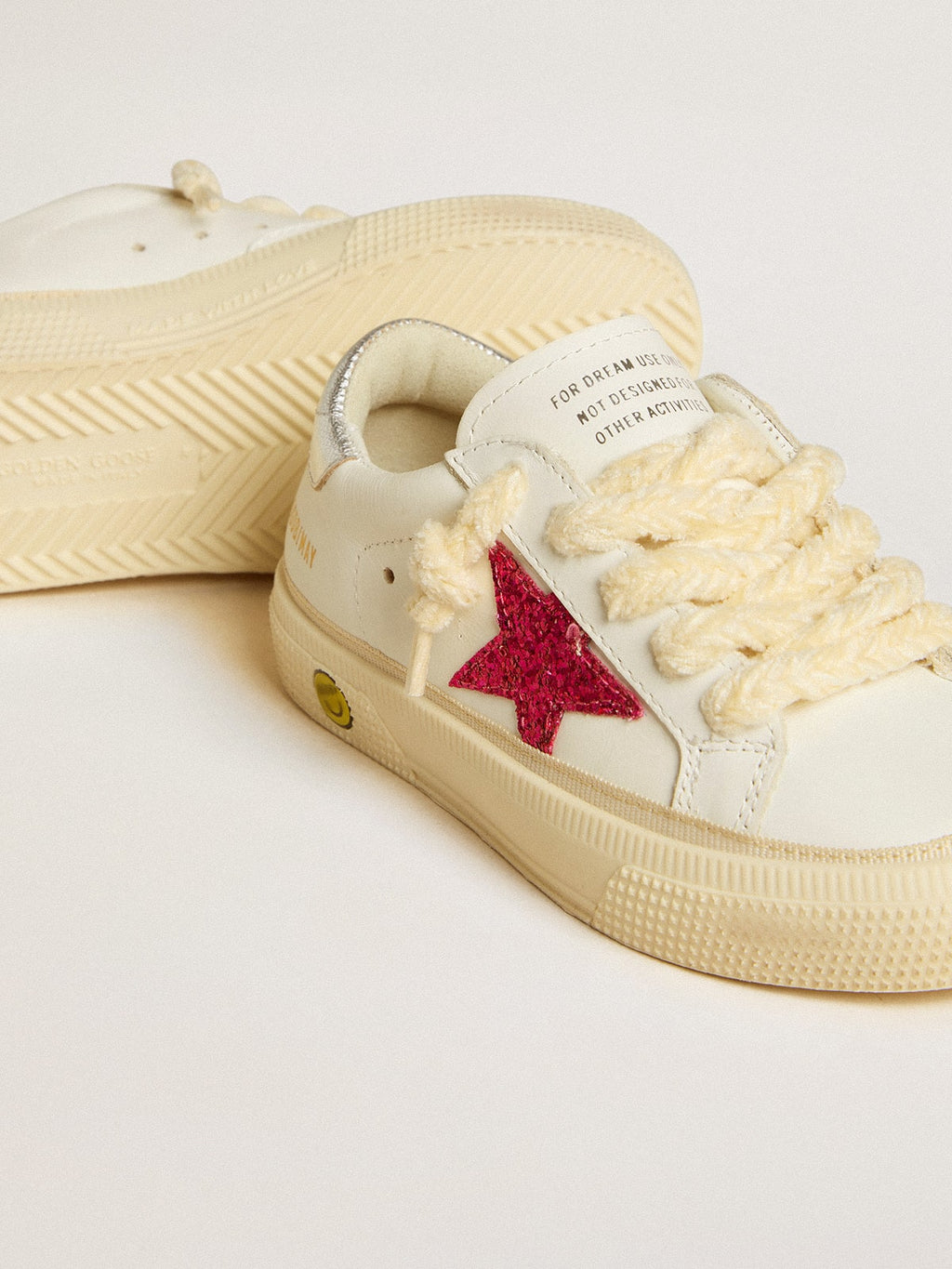 May Young with fuchsia glitter star and metallic leather heel tab| Golden Goose
