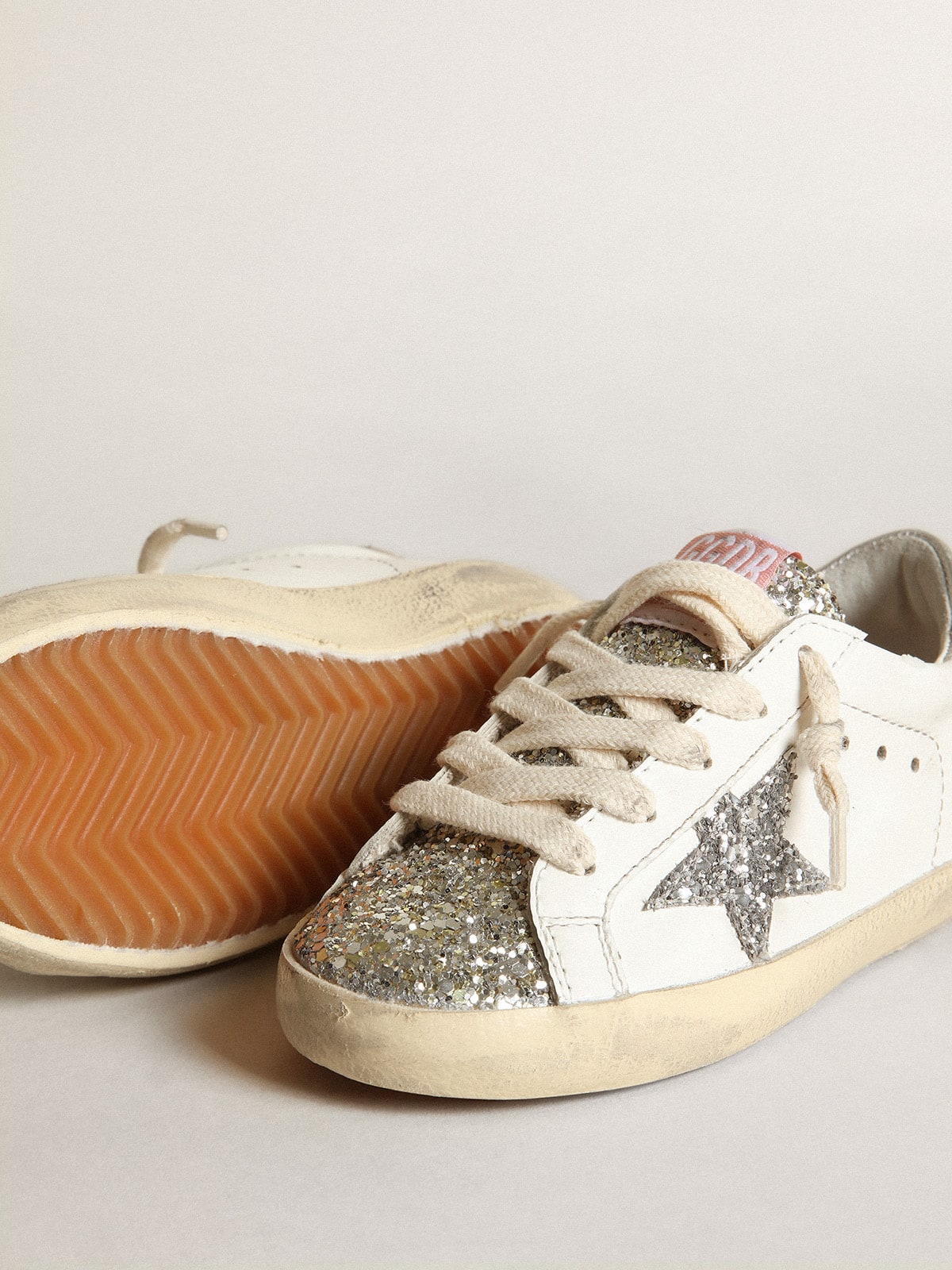 Young Super-Star with silver glitter star and platinum tongue| Golden Goose