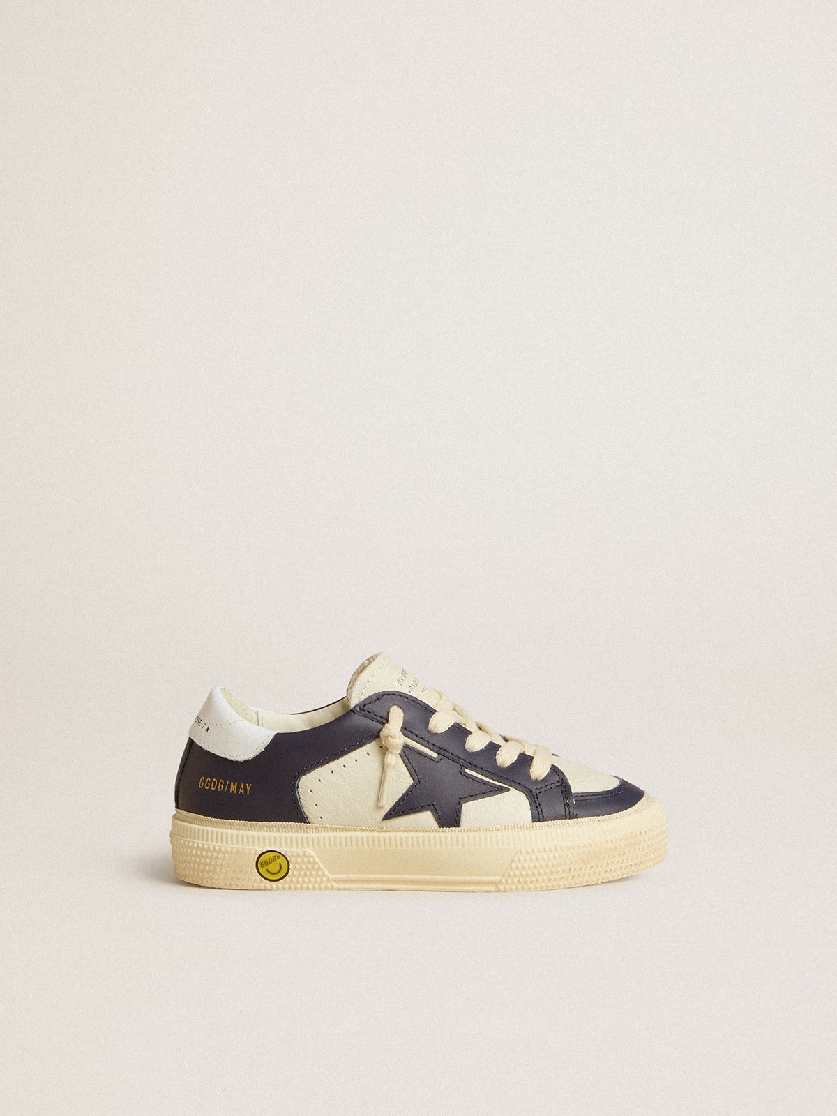 May Young in white and blue leather with leather star and heel tab| Golden Goose