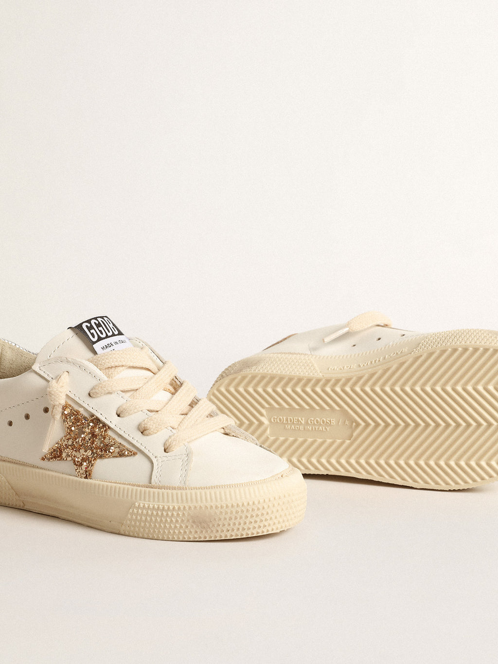 May Young with gold glitter star and metallic leather heel tab| Golden Goose