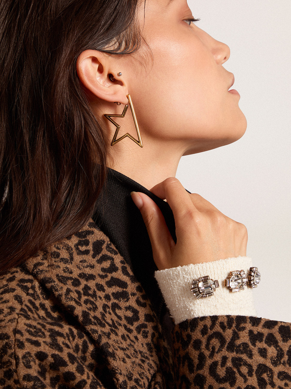 White cuff with baguette-shaped crystals| Golden Goose