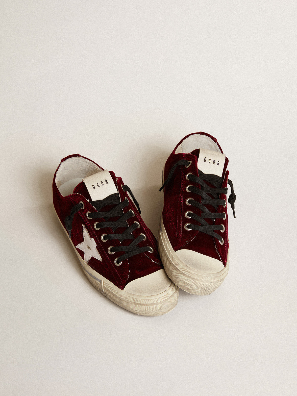 Women's V-Star LTD in burgundy velvet with white leather star| Golden Goose