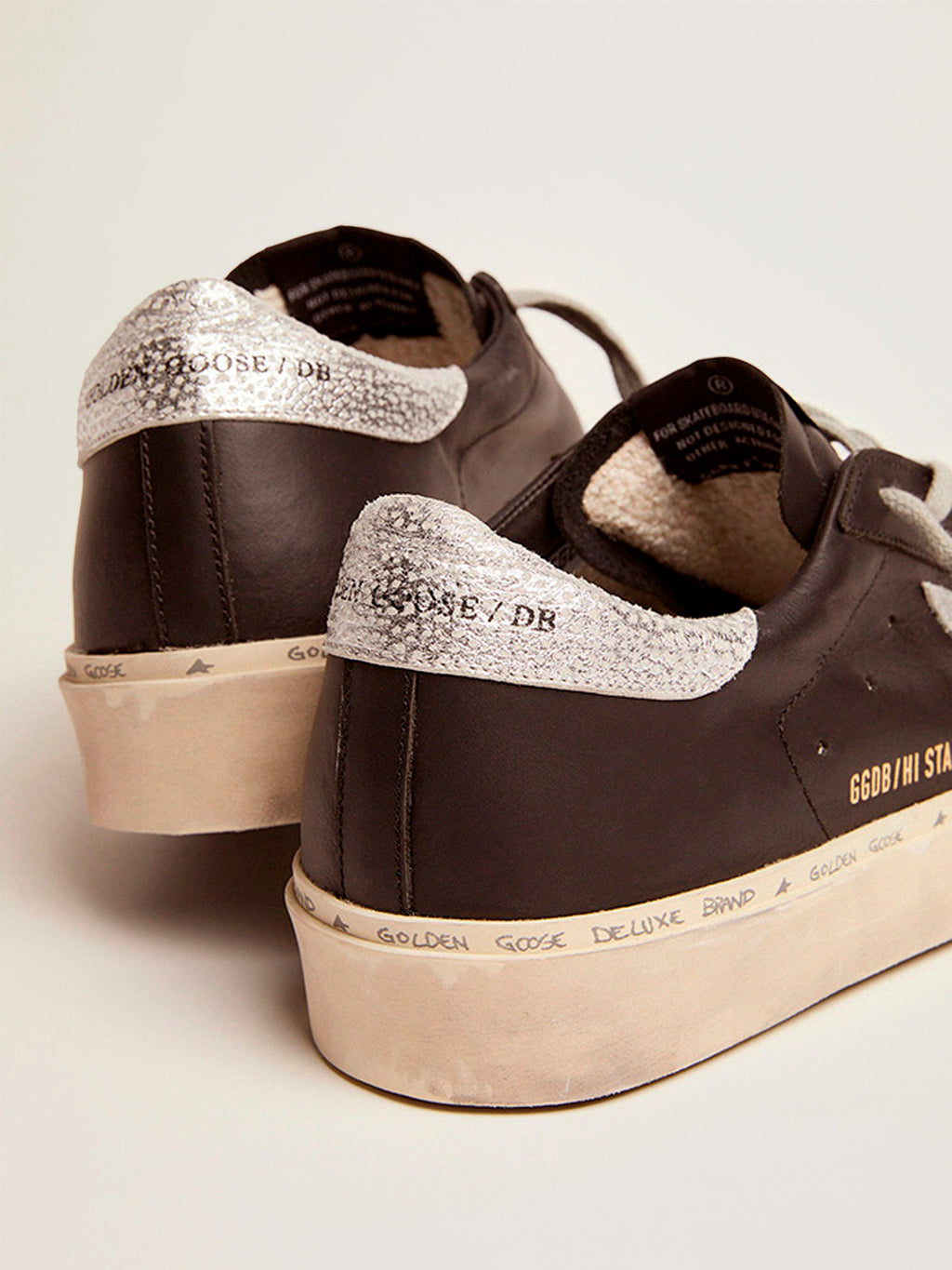 Women's Hi Star in black leather with silver laminated leather star| Golden Goose