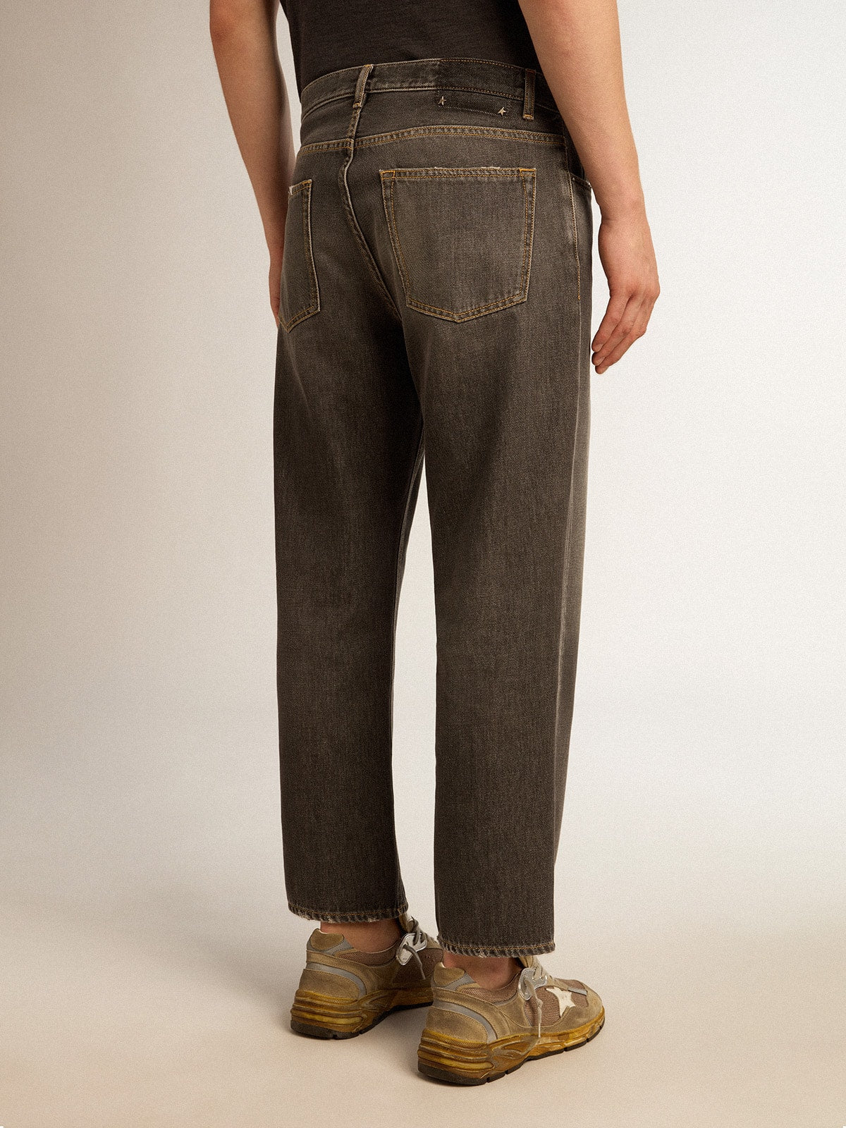 Men's stonewashed-effect black jeans| Golden Goose