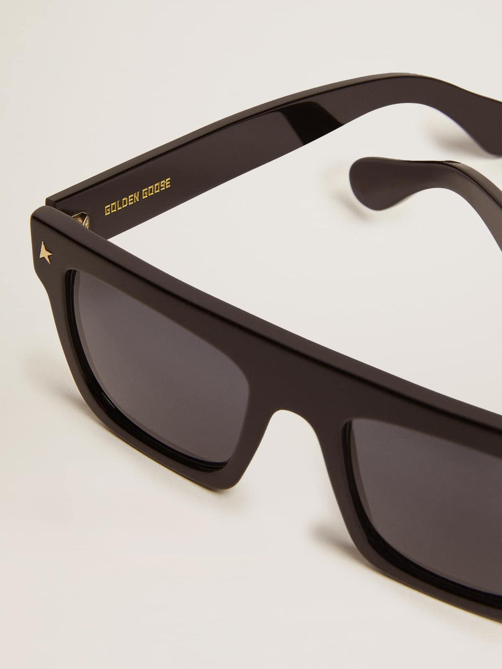 Square sunglasses with black frame and gold details| Golden Goose