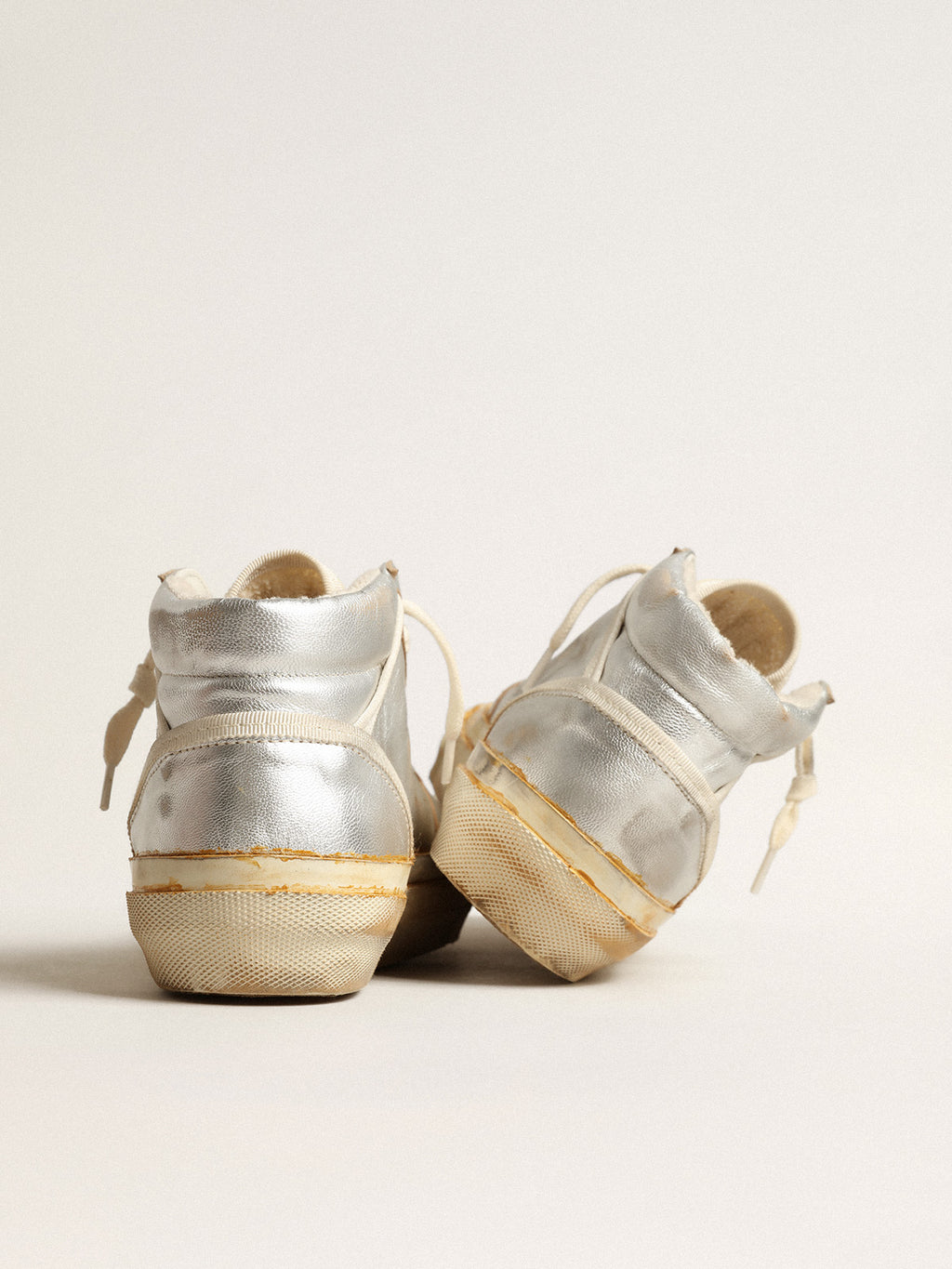 Women's Mid Star in silver metallic leather with ivory star| Golden Goose