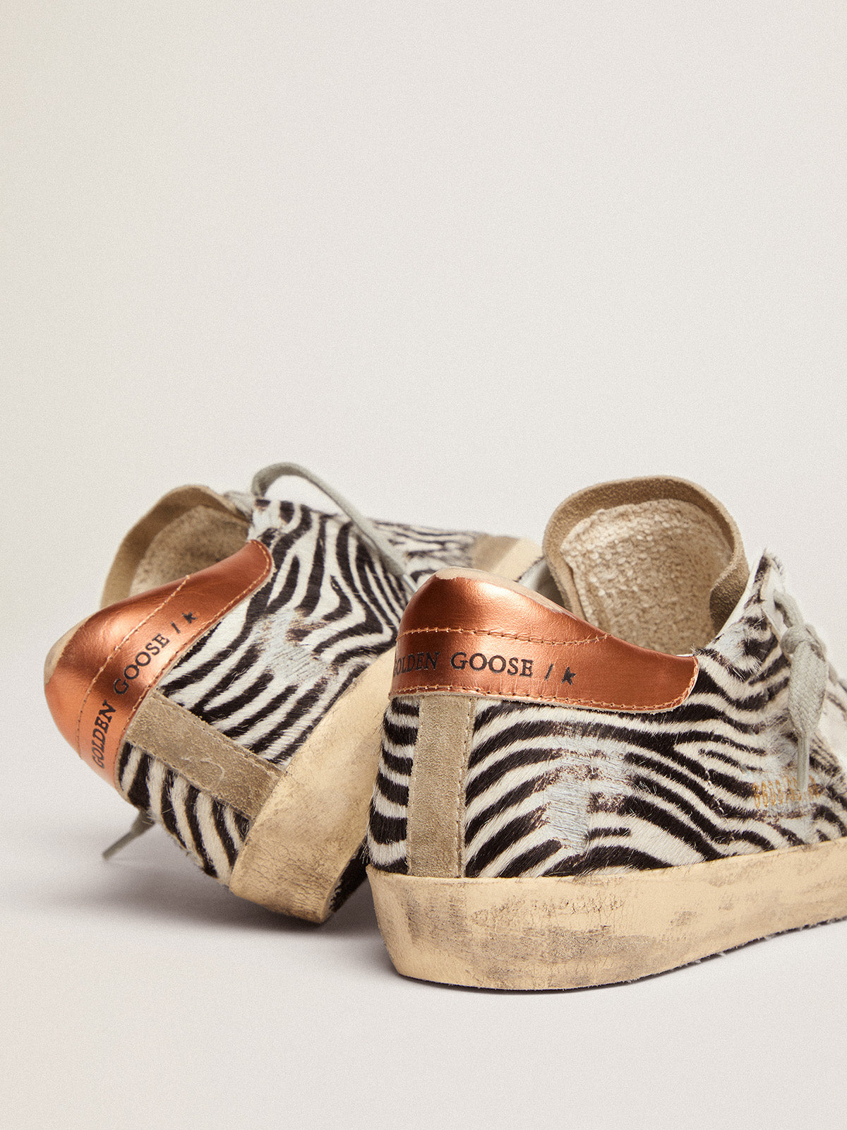 Women's Super-Star LTD in zebra print pony skin with white star| Golden Goose