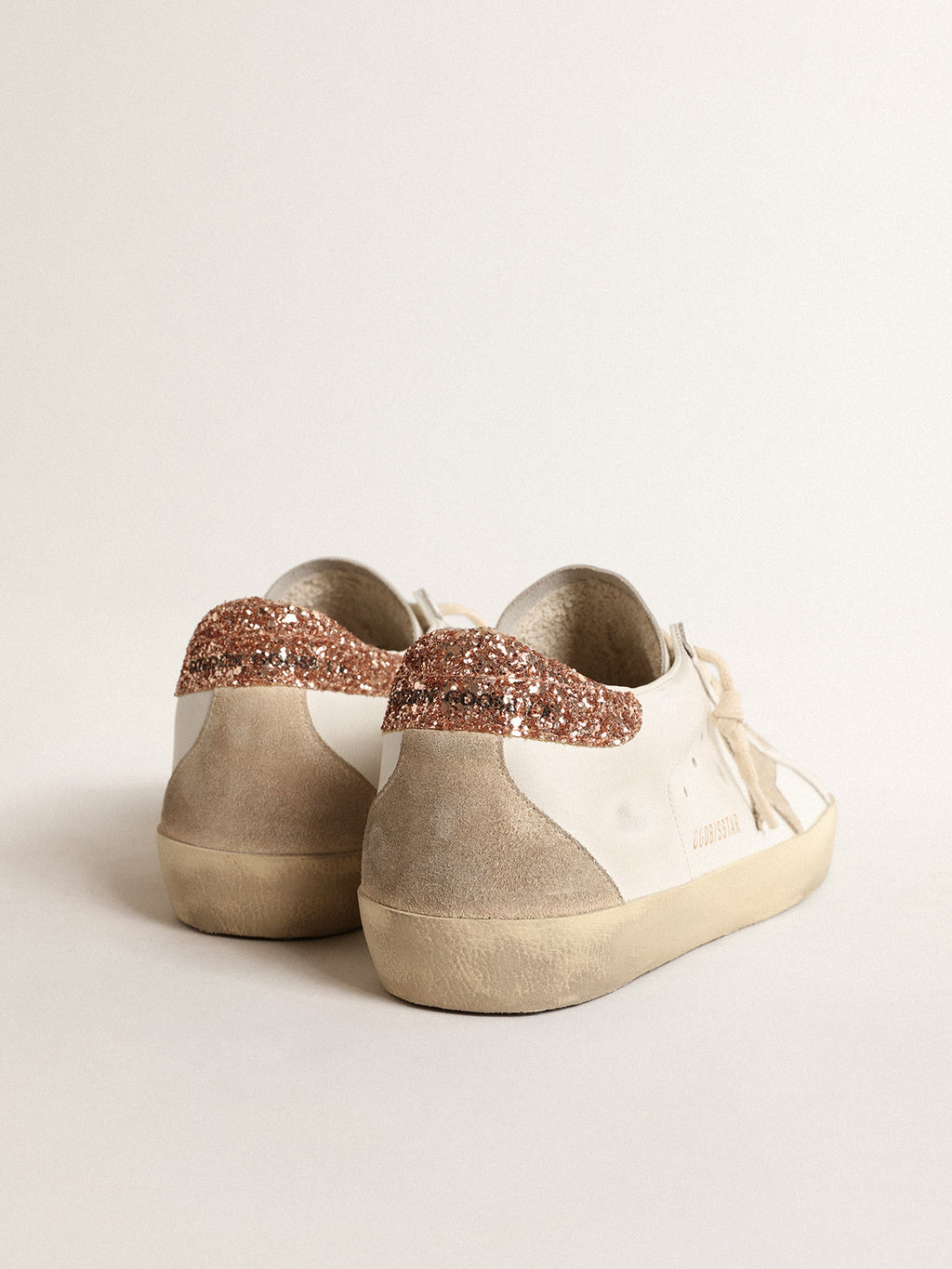 Super-Star with a suede star and peach-pink glitter heel tab| Golden Goose