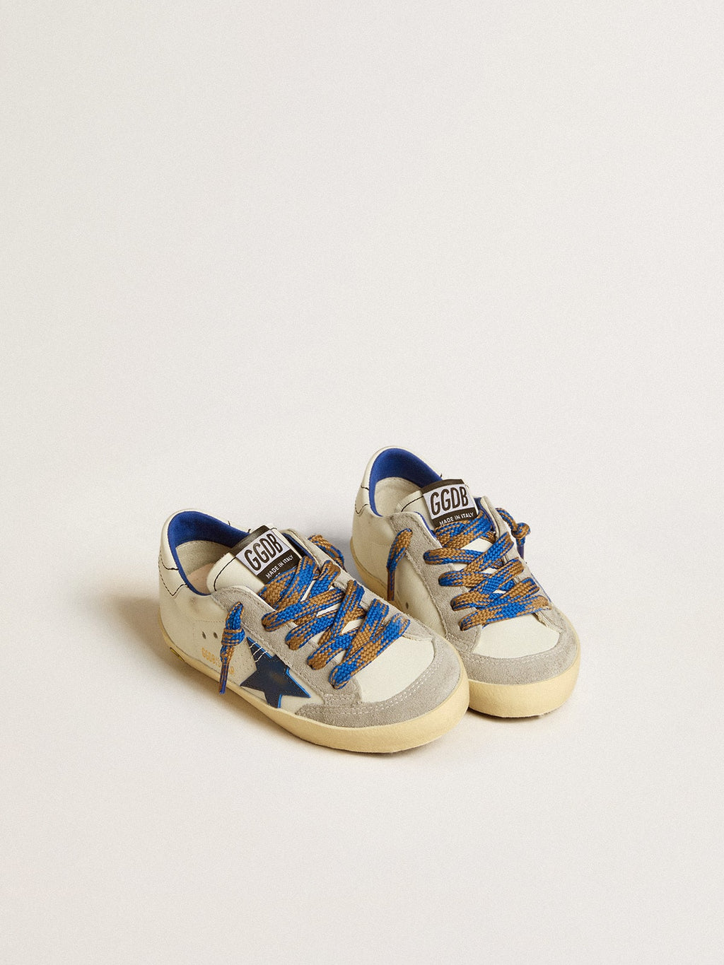 Super-Star Junior with blue leather star and ice-gray suede inserts| Golden Goose