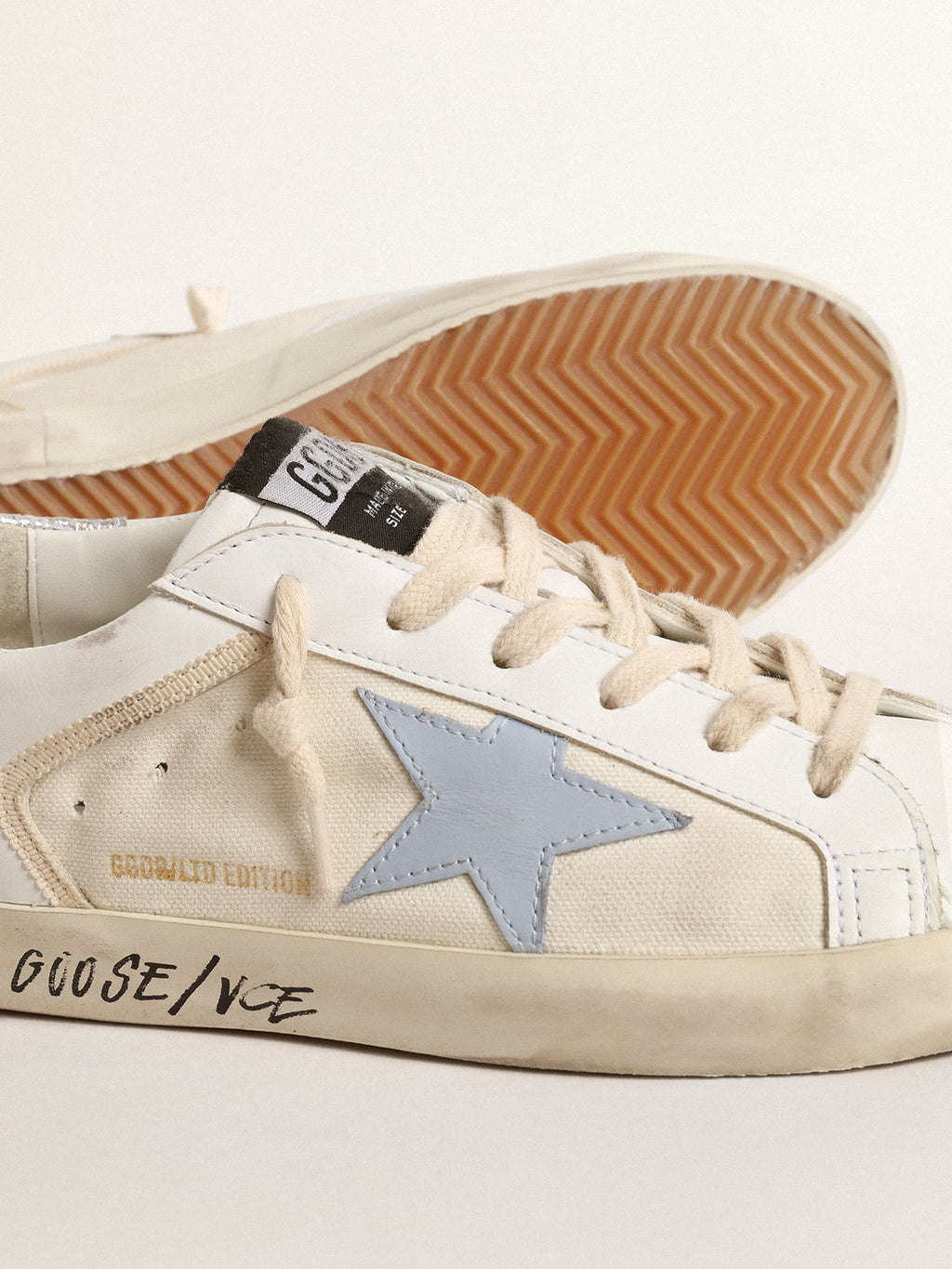 Super-Star LTD with light blue star and silver leather heel tab| Golden Goose