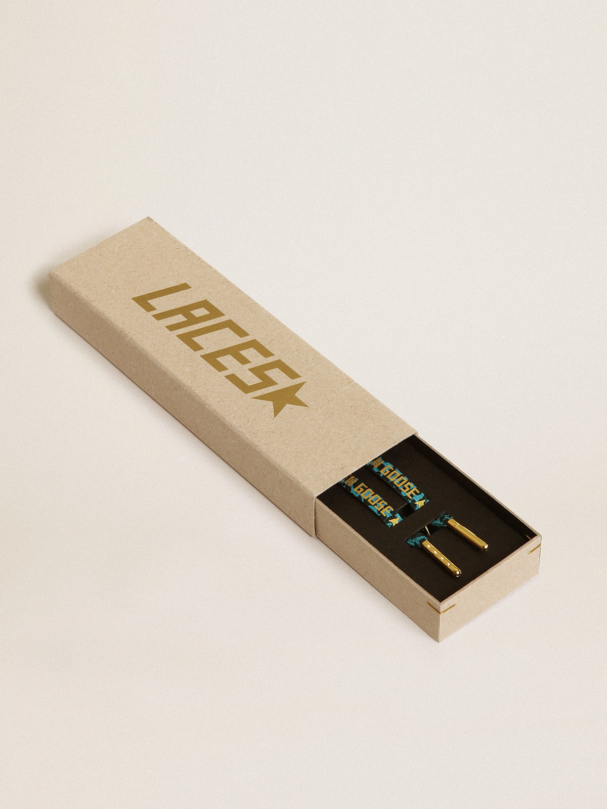 Light blue and black animal-print laces with contrasting gold-colored logo| Golden Goose