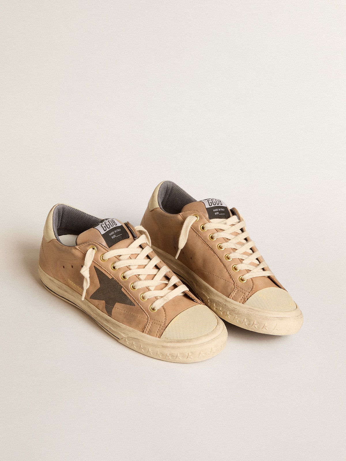 Super-Star in beige nubuck with black printed star and leather heel tab| Golden Goose
