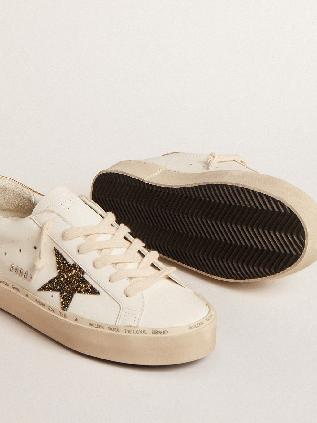 Hi Star LTD with black and gold glitter star and gold heel tab| Golden Goose