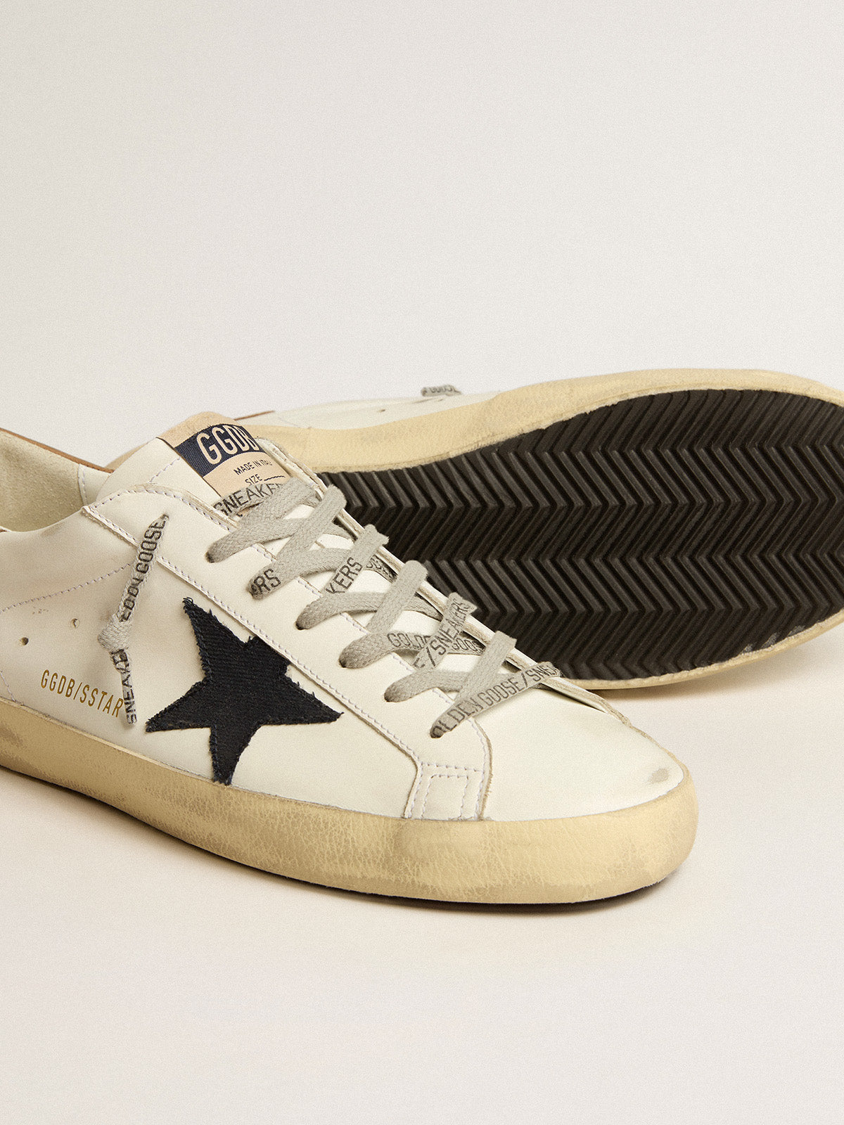 Super-Star with blue canvas star and tobacco leather heel tab| Golden Goose