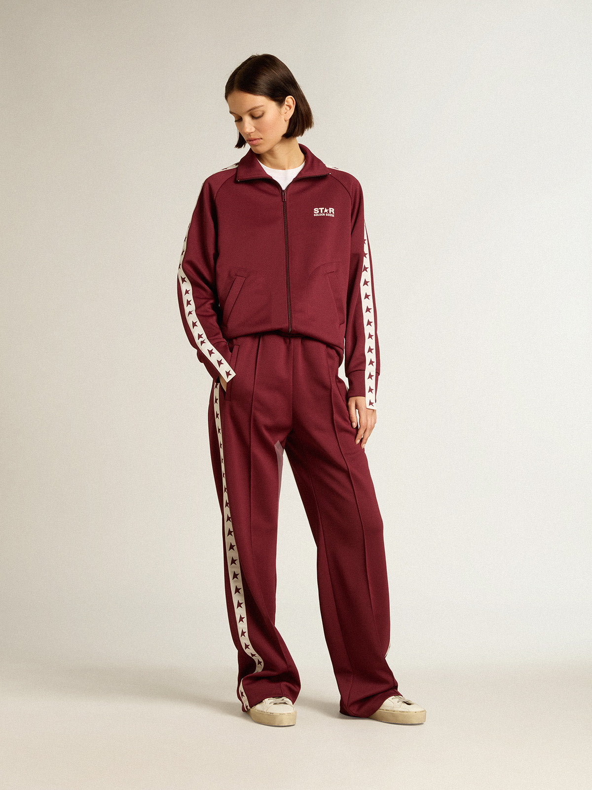 Women's burgundy zipped sweatshirt with white strip and contrasting stars| Golden Goose