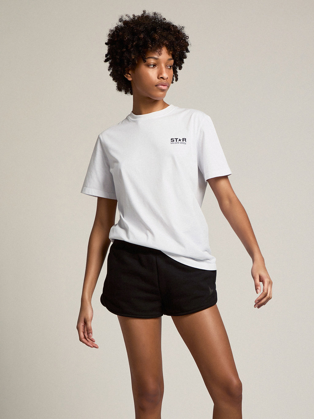 Women's white T-shirt with contrasting black logo and star| Golden Goose