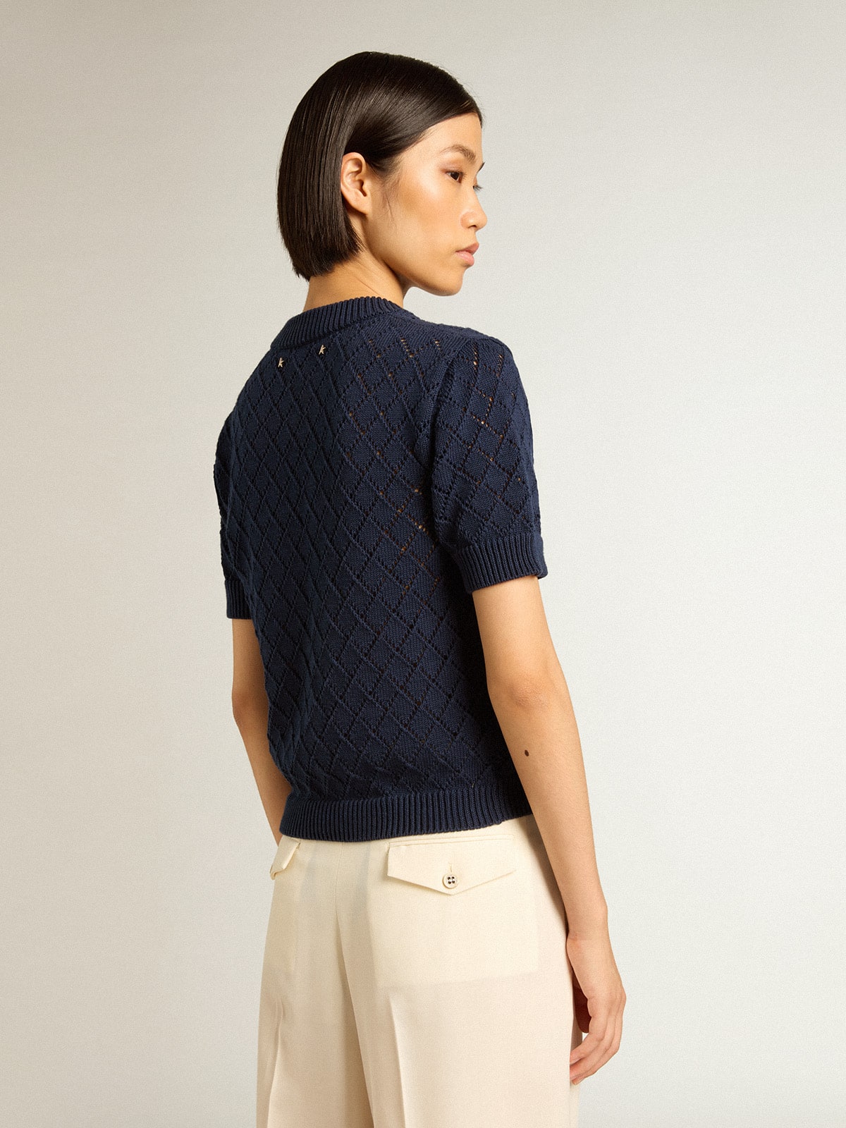 Open-weave knit with midnight blue argyle pattern