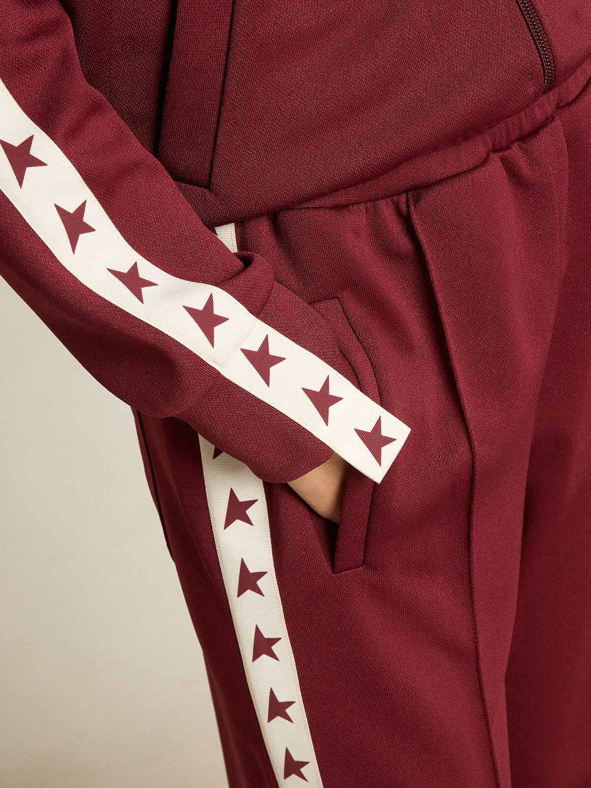 Women's burgundy zipped sweatshirt with white strip and contrasting stars| Golden Goose