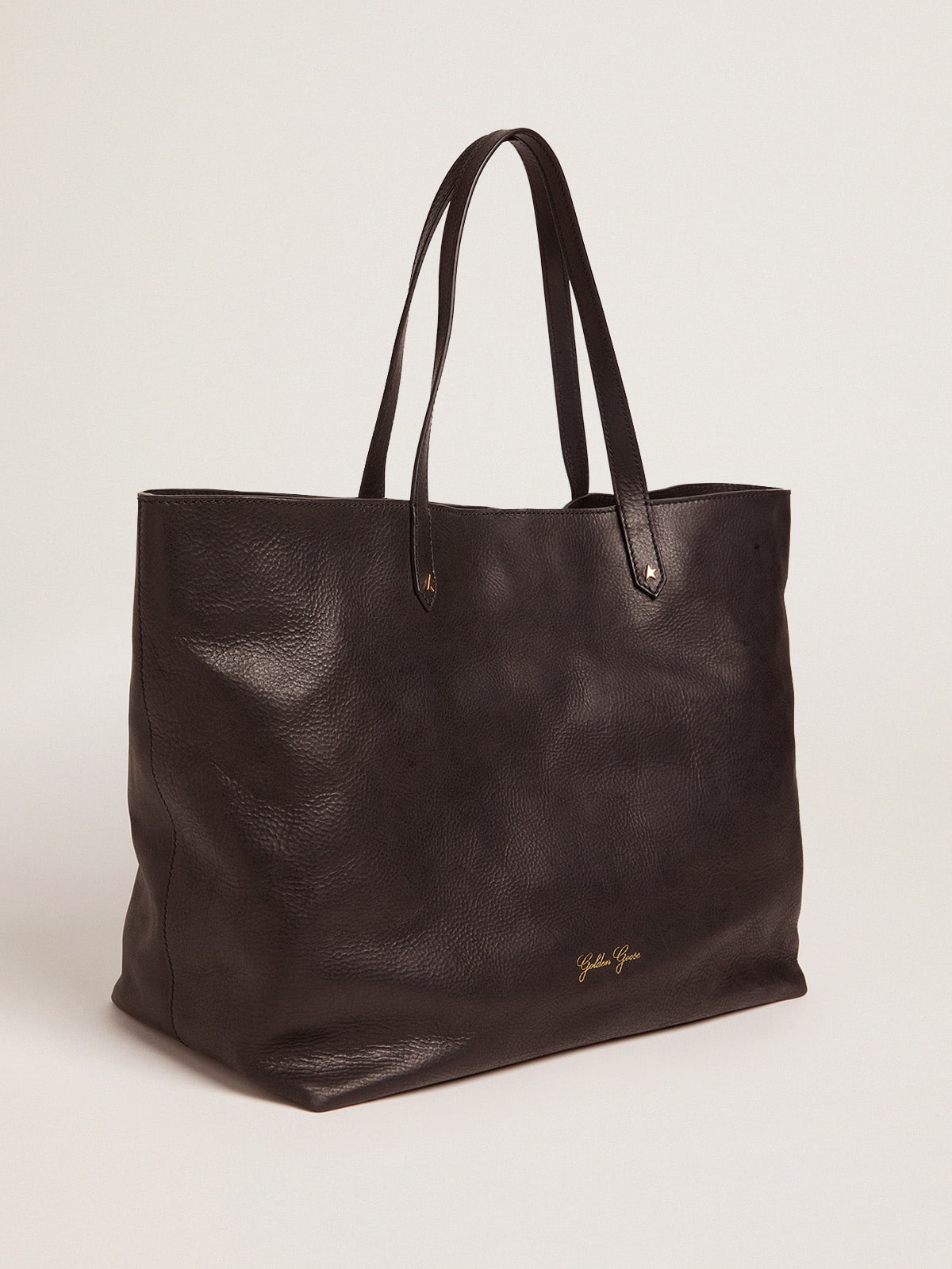 Pasadena Bag in black hammered leather with gold logo on the front| Golden Goose