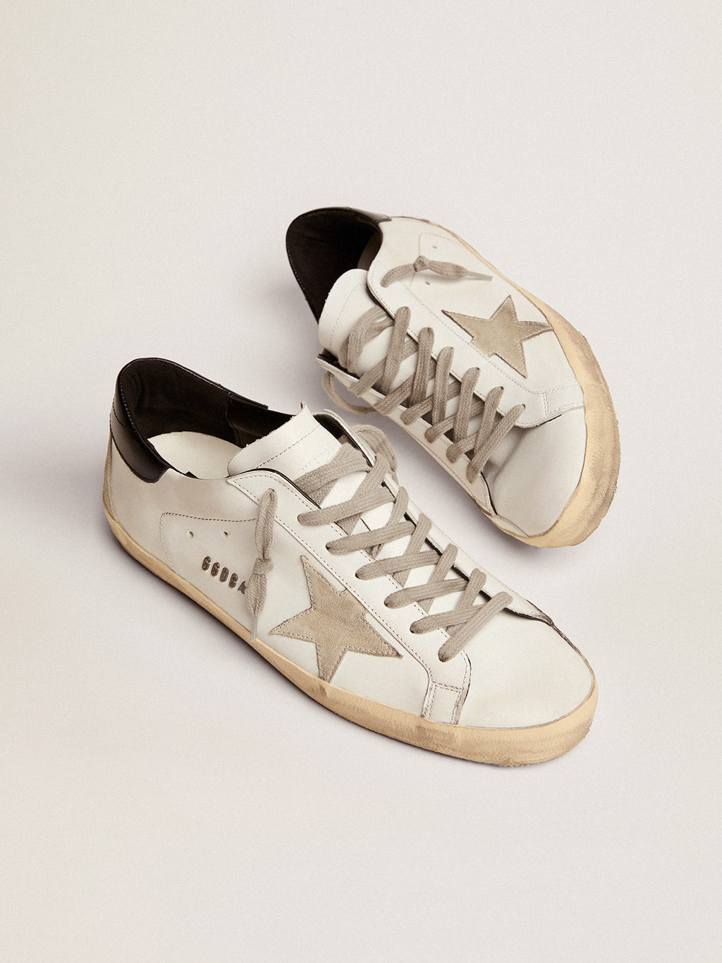 Men's Super-Star with black heel tab and metal stud lettering| Golden Goose