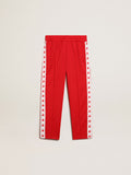 Red joggers with white stripe with contrasting red stars| Golden Goose
