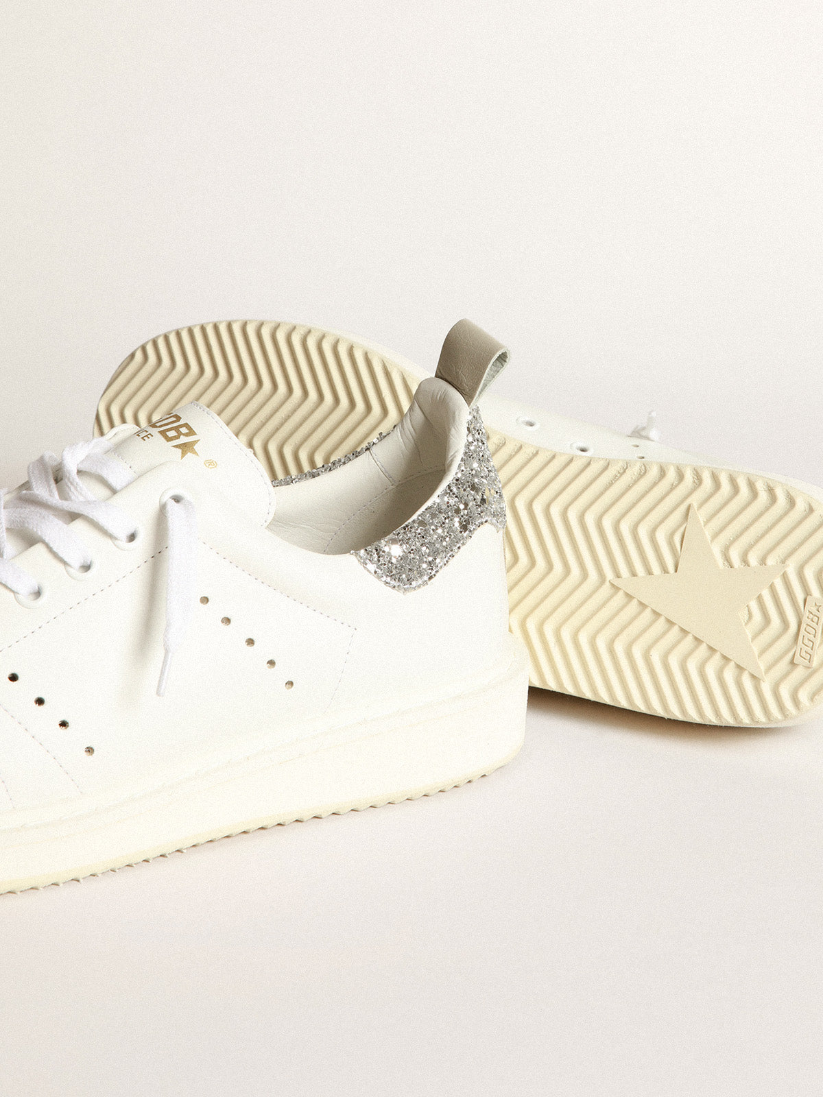 Starter sneakers in white leather with silver glitter heel tab| Golden Goose