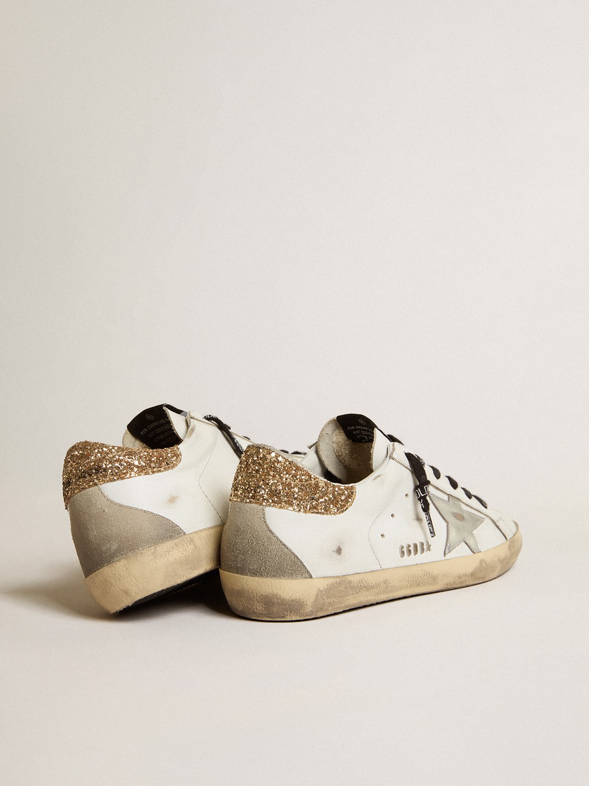 Women's white leather Super-Star sneakers with glittery heel tab| Golden Goose