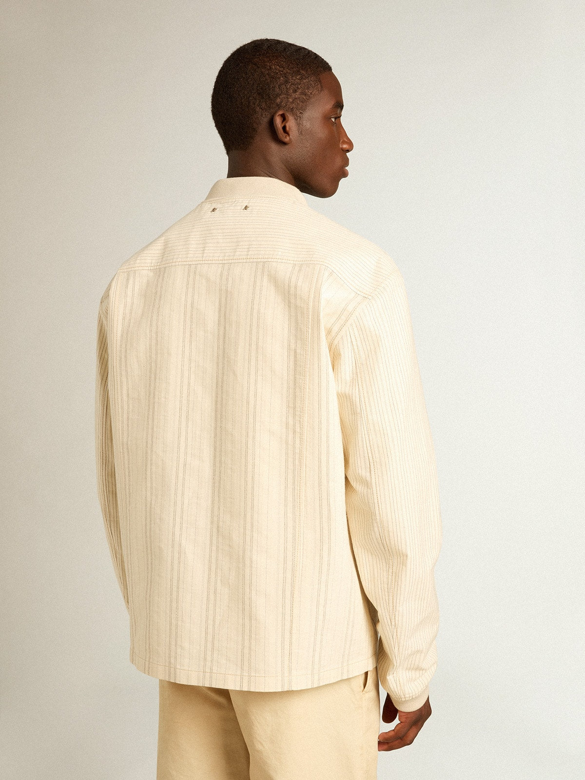 Ecru-colored cotton jacket with zip fastening