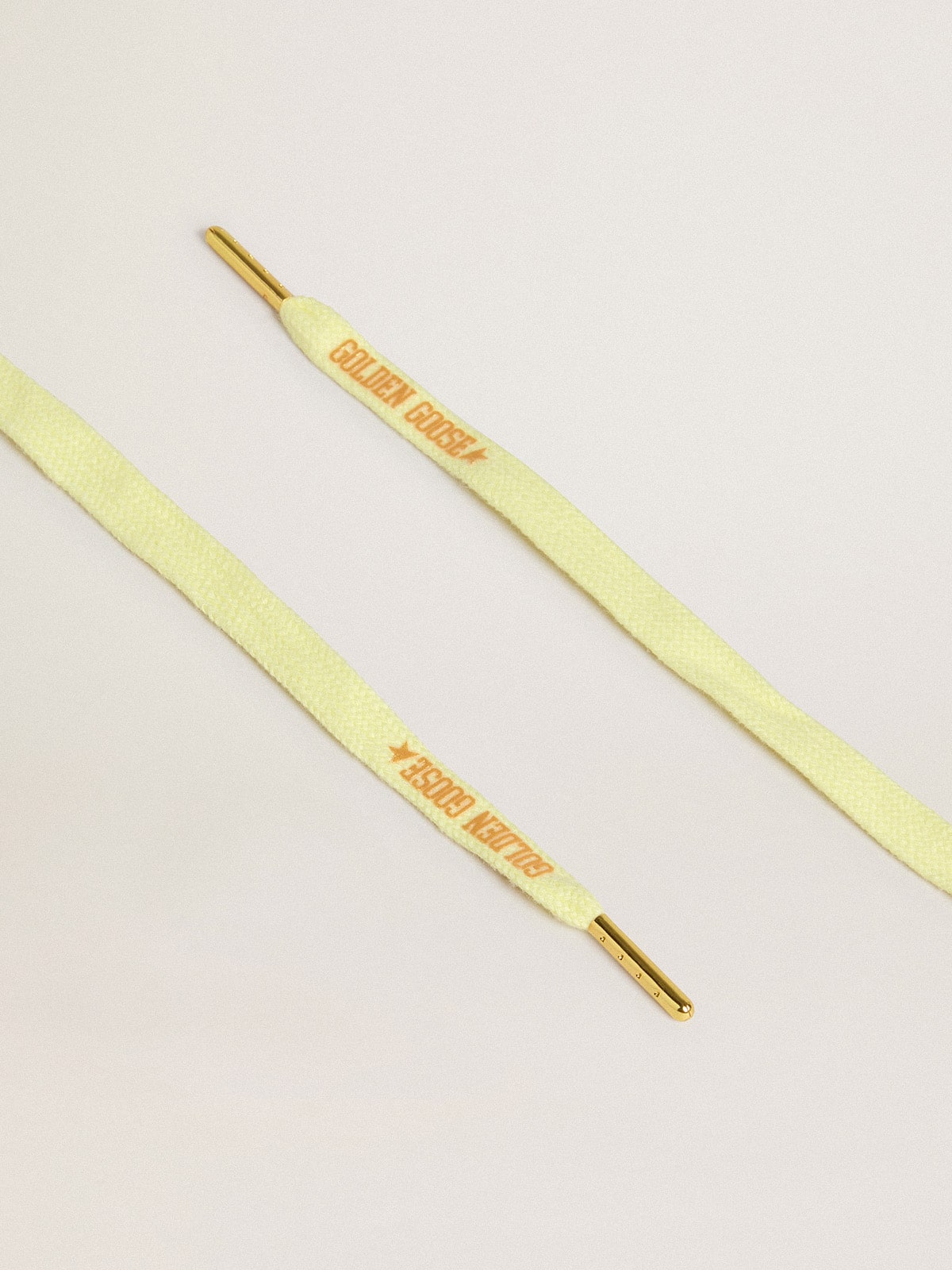Yellow cotton laces with contrasting gold-colored logo| Golden Goose