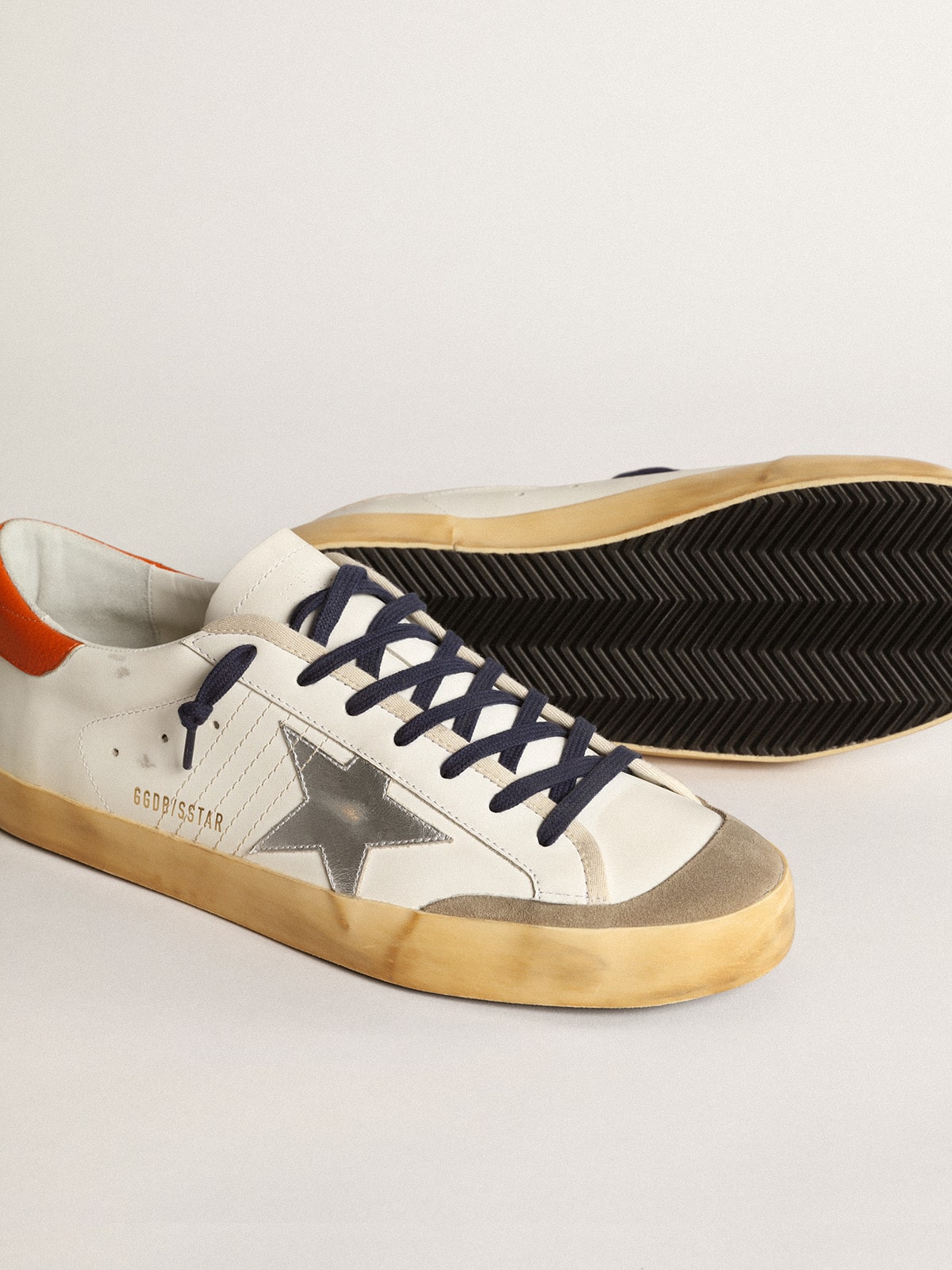 Super-Star Penstar with silver star and orange heel tab| Golden Goose