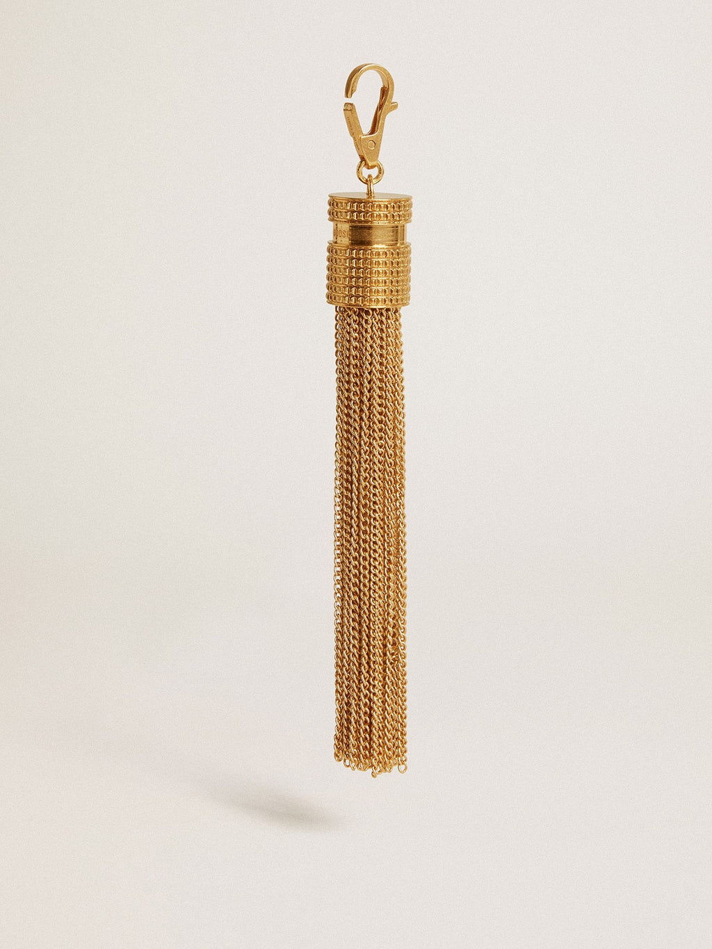Tassel-shaped charm in antique gold-colored brass| Golden Goose