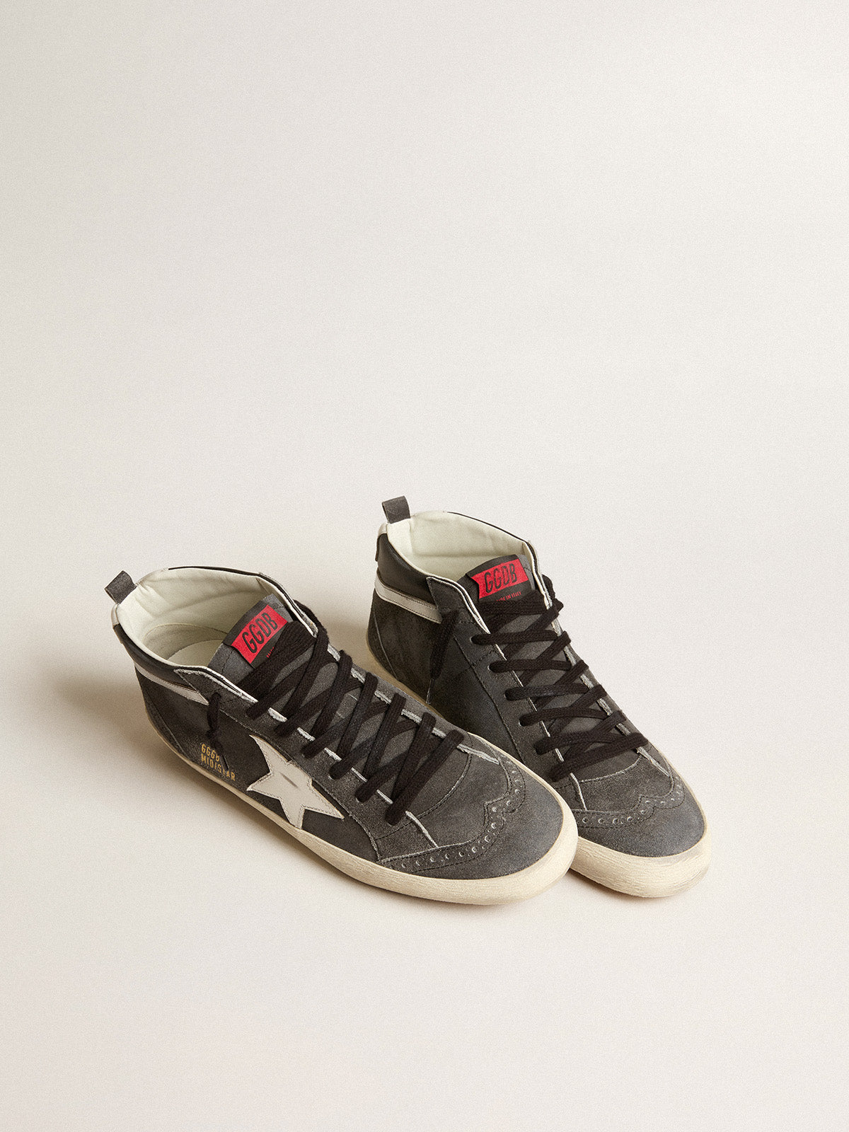 Mid Star in black suede with white leather star and silver flash| Golden Goose