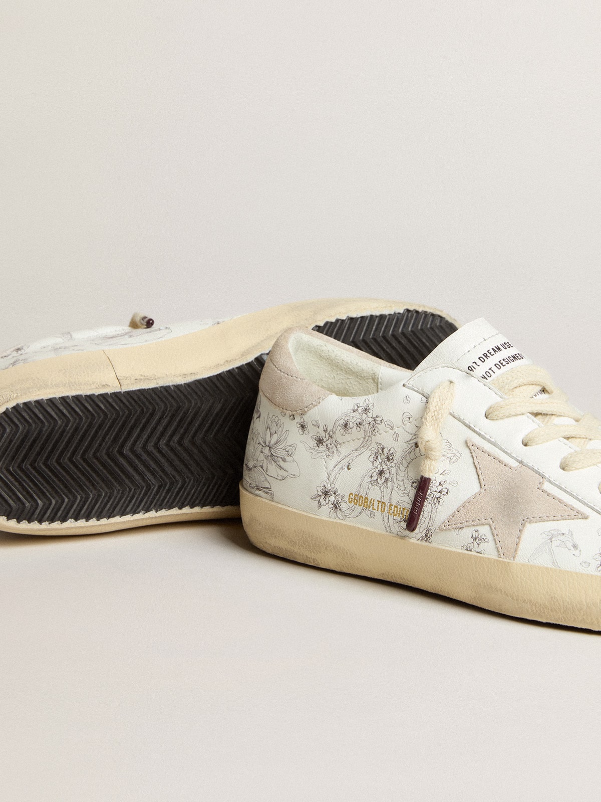 Men's Super-Star LTD CNY in white leather with lettering on the upper
