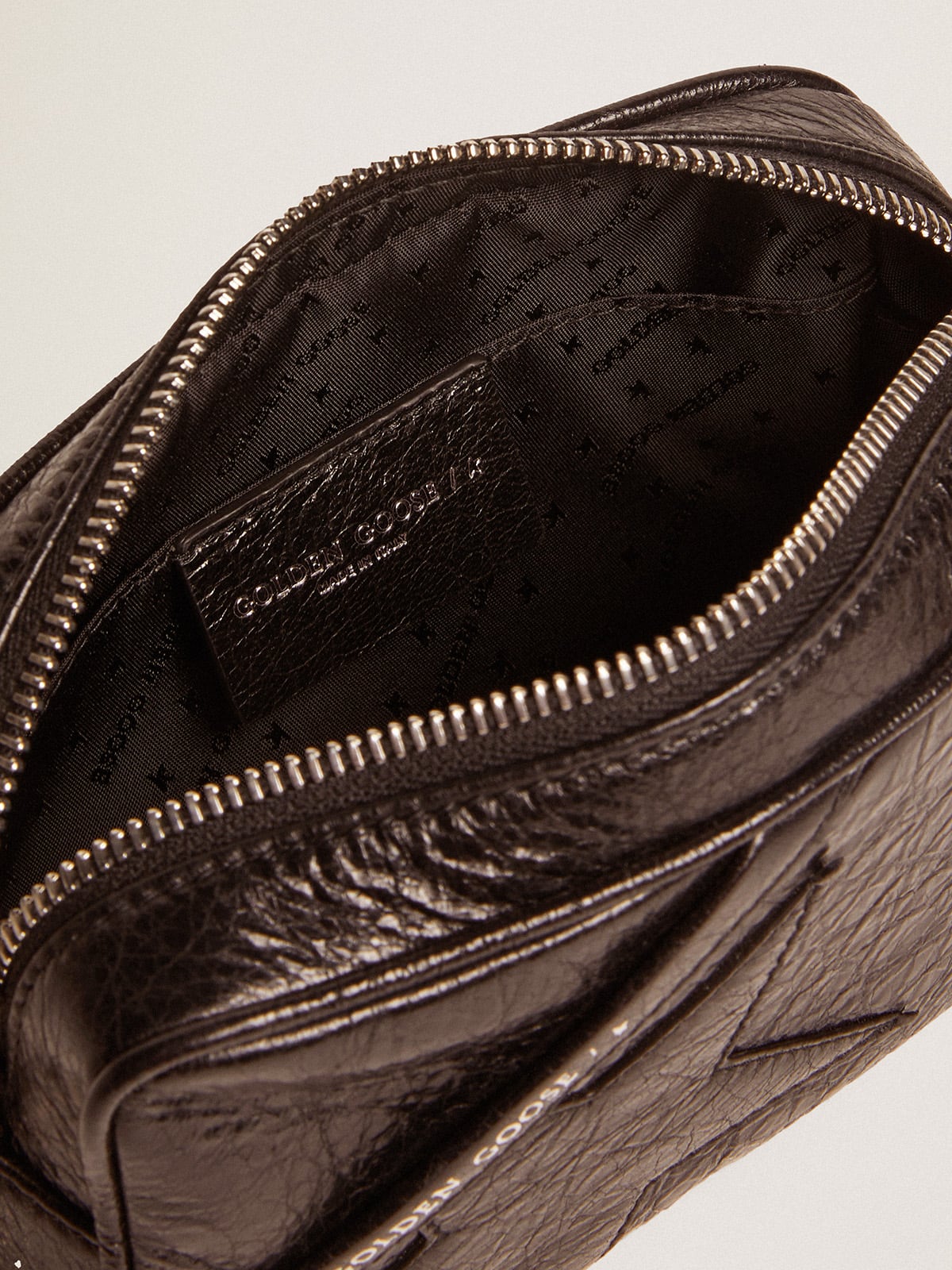 Women's Mini Star Bag in black glossy leather with tone-on-tone star| Golden Goose