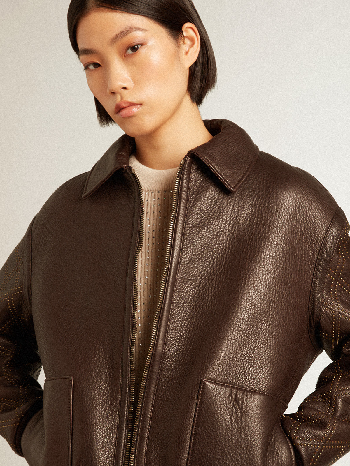 Brown nappa leather jacket with studded sleeves| Golden Goose