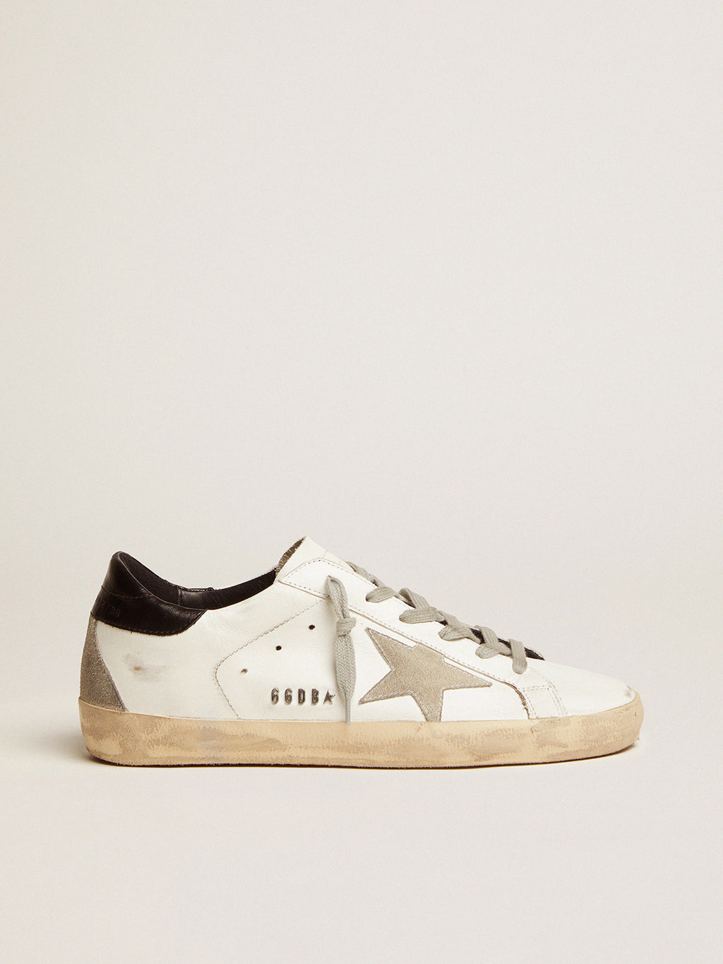 Women's Super-Star with black heel tab and metal stud lettering| Golden Goose
