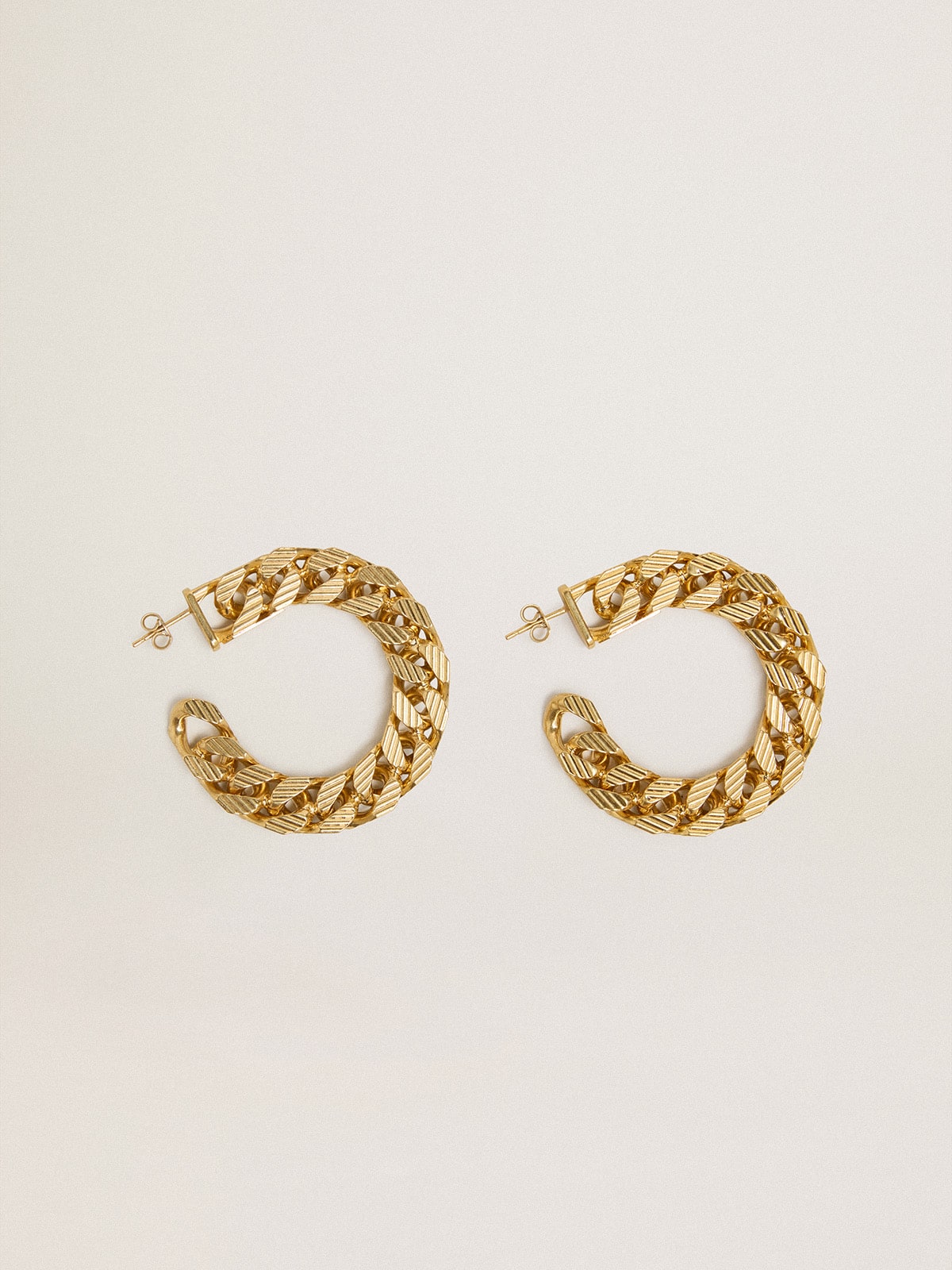 Chain hoop earrings with antique gold colored braided links| Golden Goose