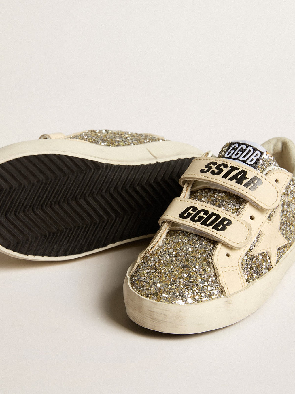 Old School Junior in platinum glitter with leather star and heel tab| Golden Goose