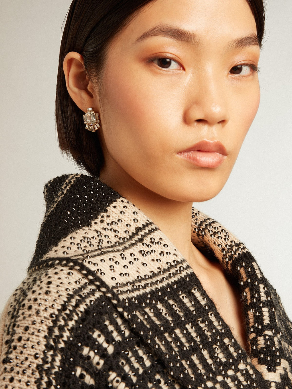 Women's cardigan in ecru wool with jacquard design and belt