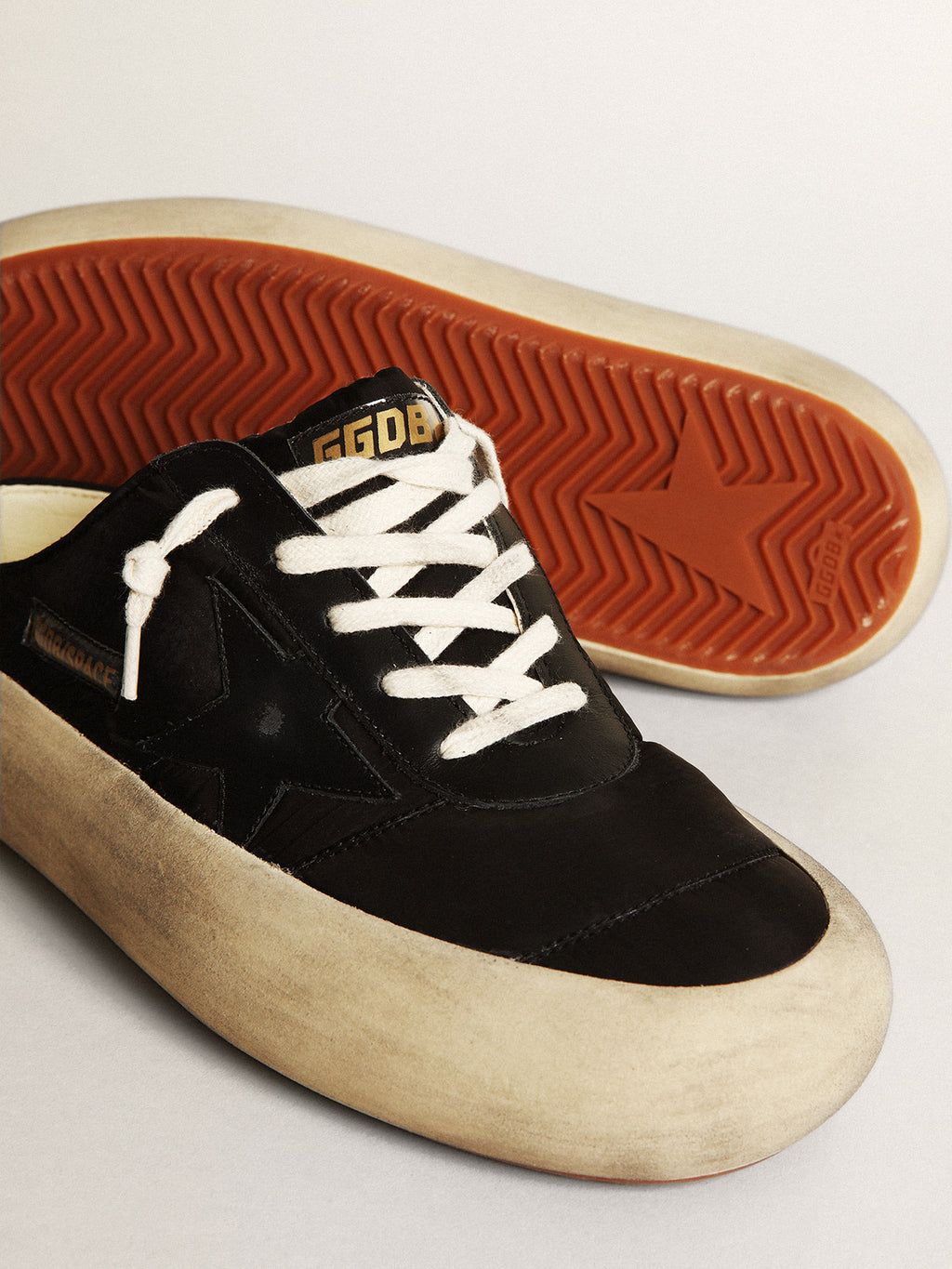 Women's Space-Star Sabots in black nylon with black leather star| Golden Goose