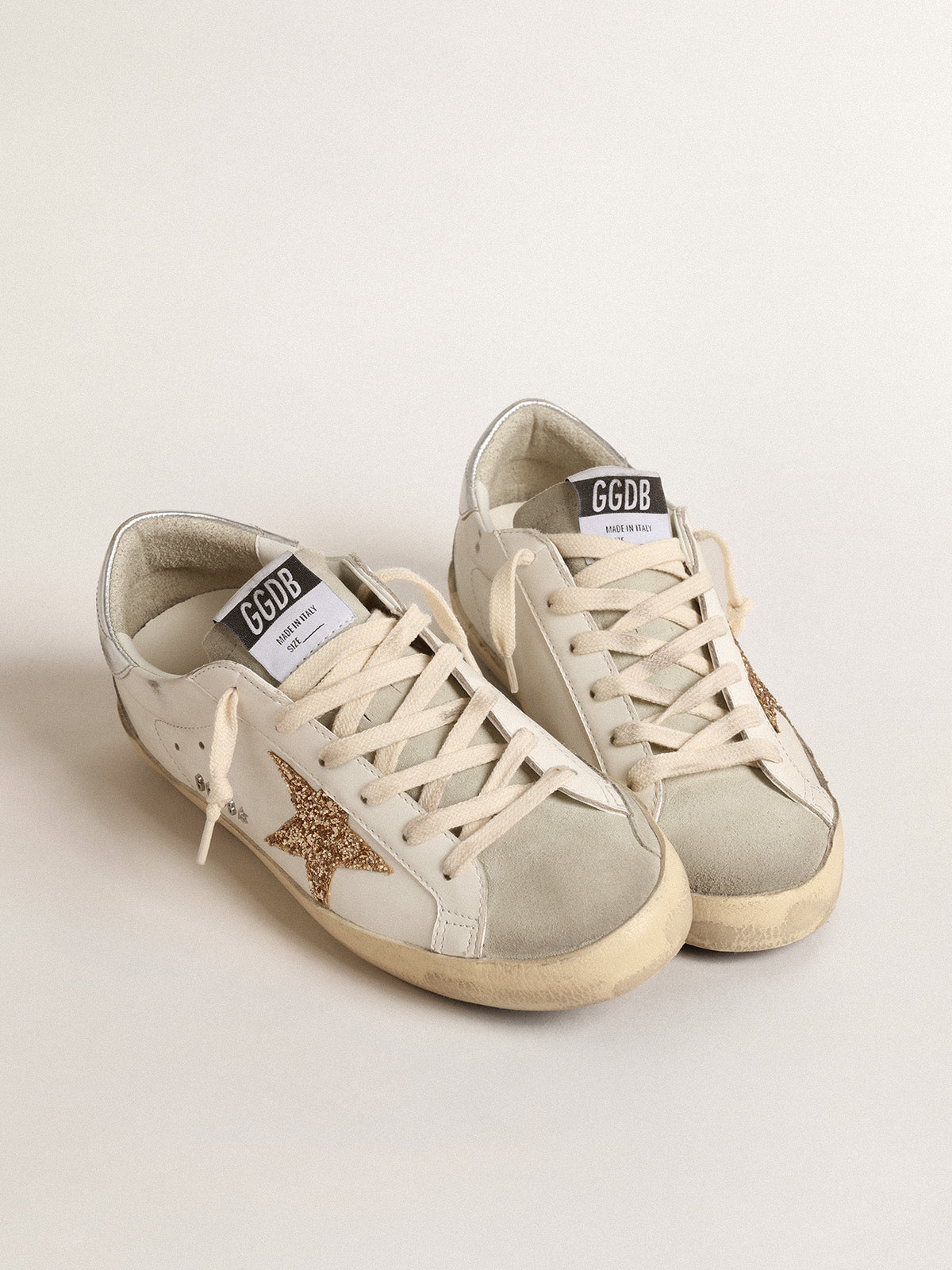 Super-Star with gold glitter star and ice-gray suede inserts| Golden Goose