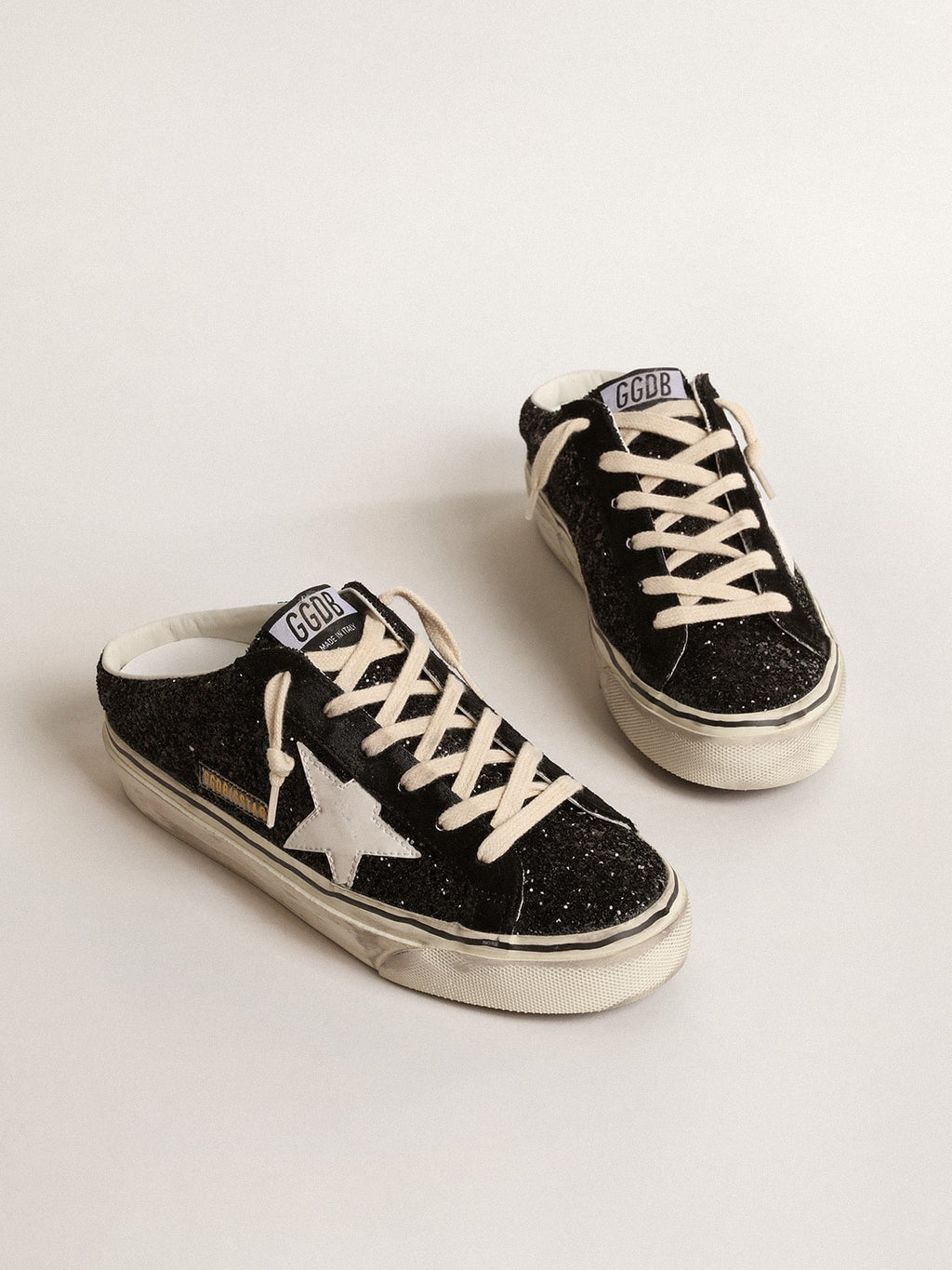 Super-Star Sabots in black glitter with white bio-based star| Golden Goose