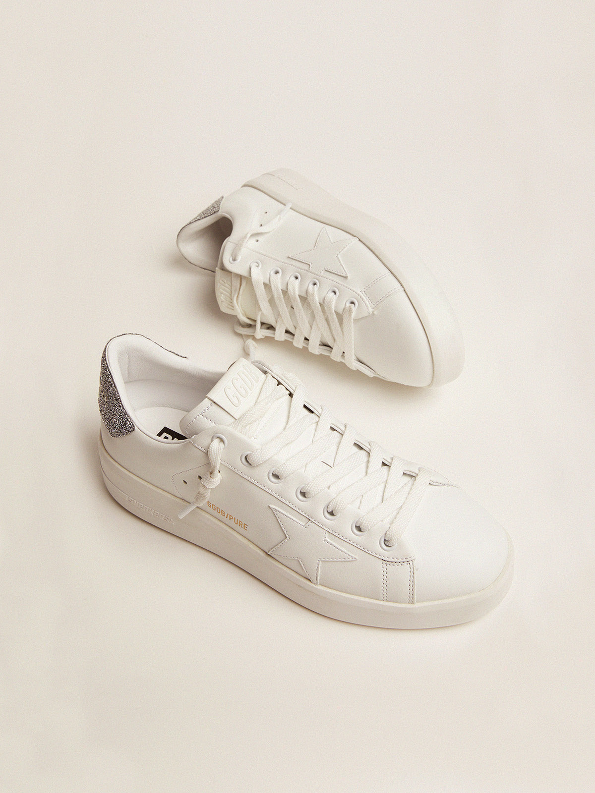 Purestar sneakers in white leather with silver Swarovski crystal heel tab| Golden Goose
