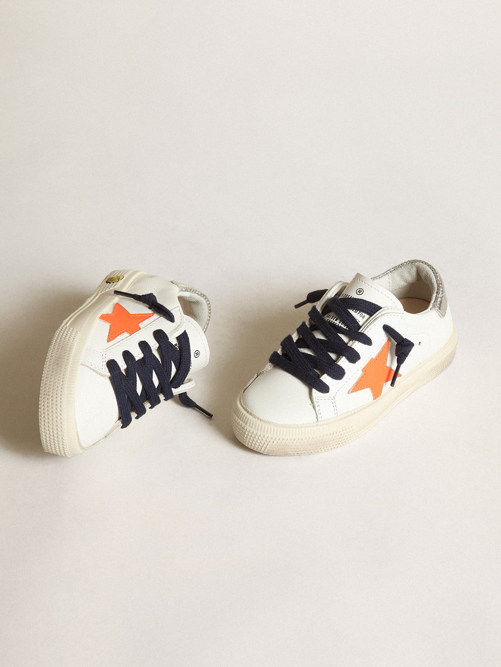 Young May with fluorescent orange leather star and perforated heel| Golden Goose