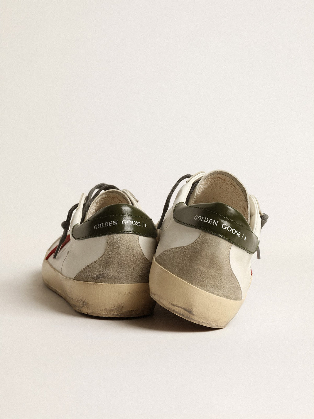 Men's Super-Star with red suede star and green leather heel tab| Golden Goose