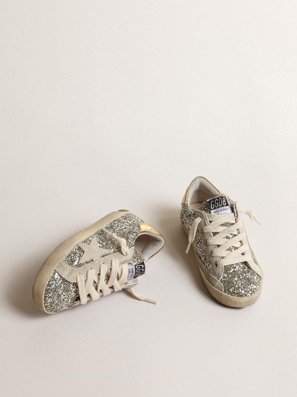Super-Star Young in glitter with a suede star and gold heel tab| Golden Goose
