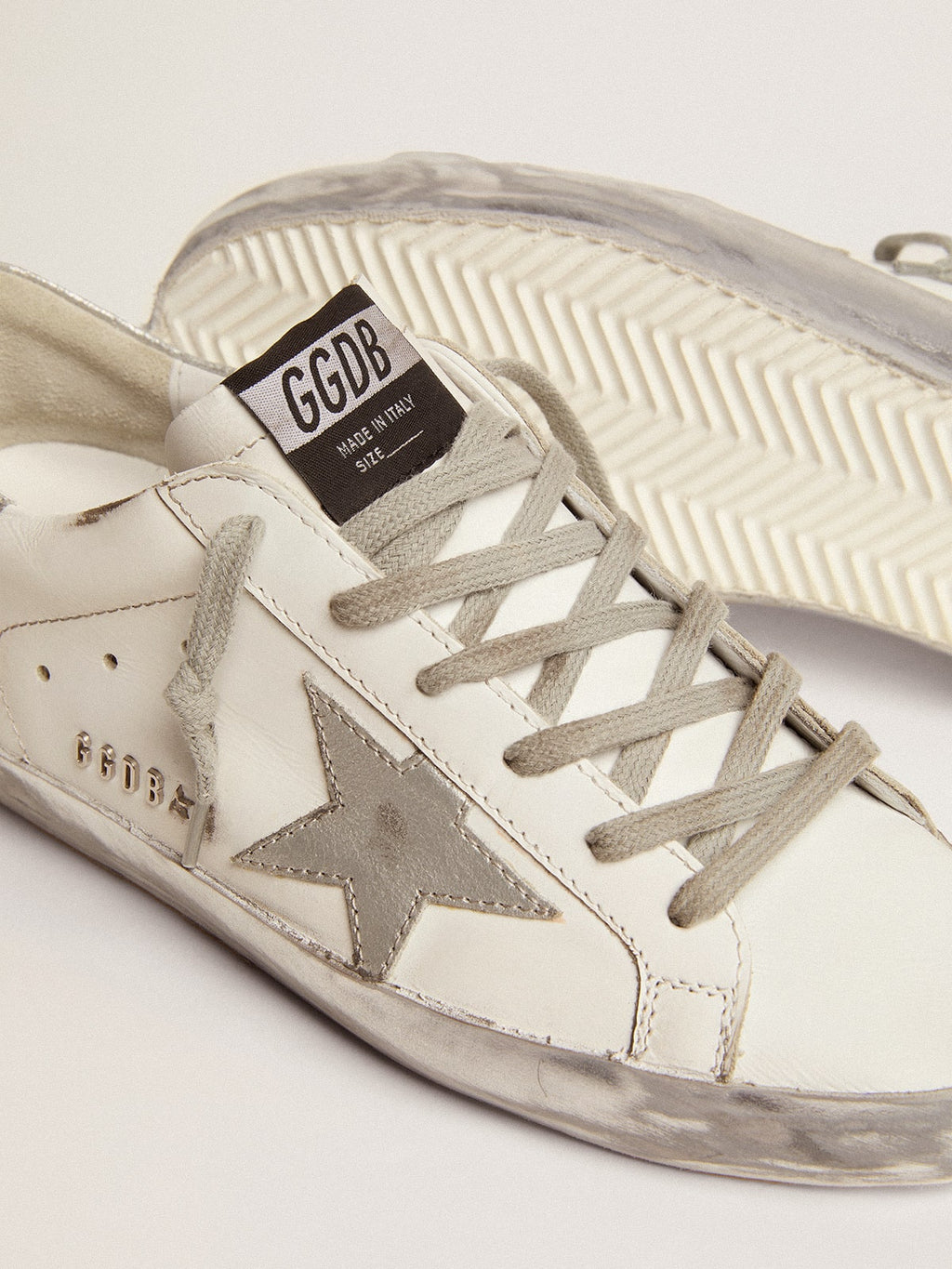 Women's Super-Star with silver sparkle foxing and metal stud lettering| Golden Goose