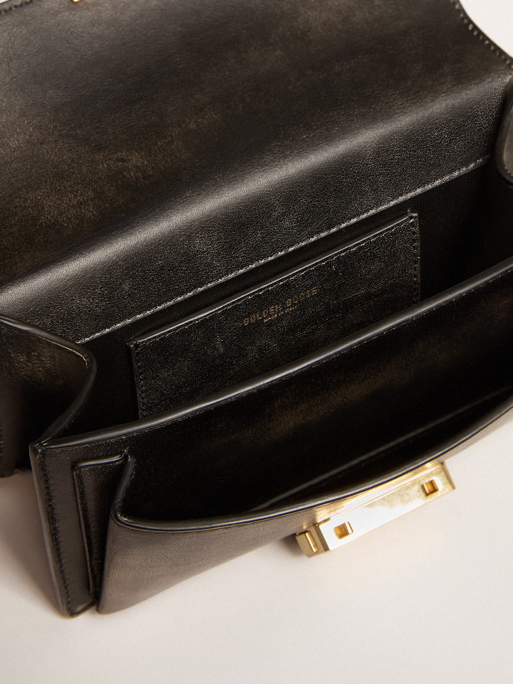 Small Venezia Bag in black distressed leather with gold details| Golden Goose