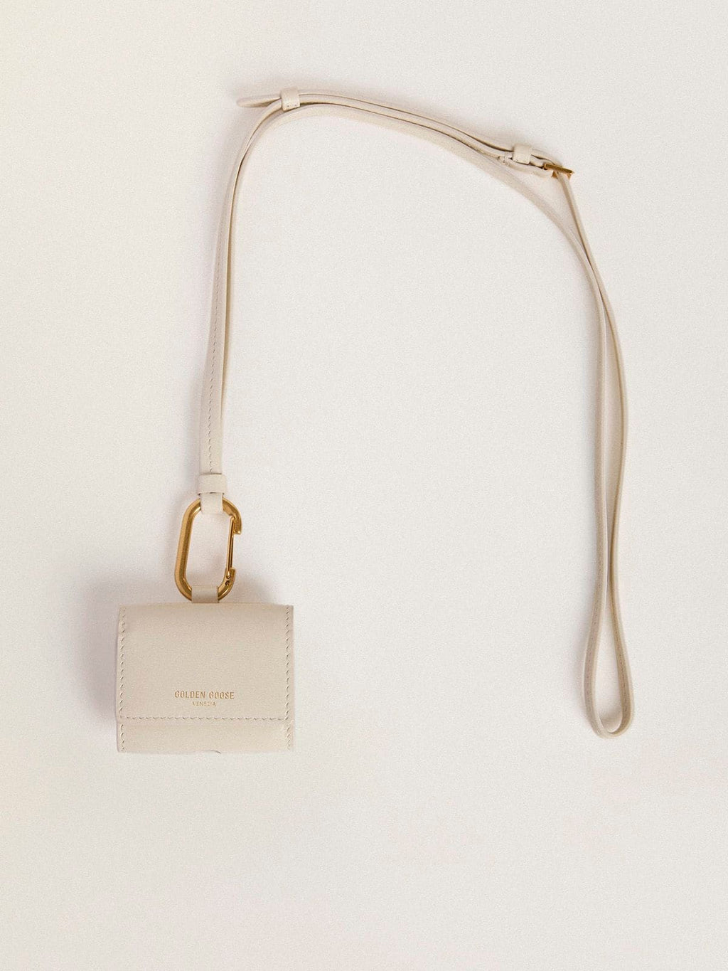 Worn white AirPod case| Golden Goose