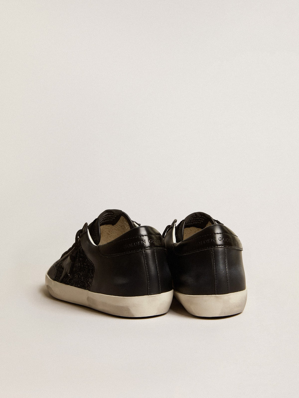 Women's Super-Star in black nappa and glitter with glossy black leather star| Golden Goose